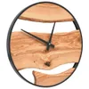 A round wall clock made of wood and metal. Anteprima dell’immagine prodotto