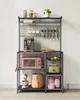 A kitchen baker's rack filled with appliances and accessories. Produktbild-Vorschau