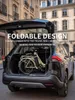 A folded electric bicycle is placed in the trunk of a car. Produktbild-Vorschau