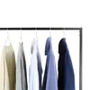 Several garments are hanging on a clothes rack against a white background. Produktbild-Vorschau