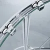 Close-up view of a shower door's sliding mechanism, showing the rollers and track. Produktbild-Vorschau