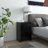 A bedroom scene with a nightstand, plant, and bed. Náhled obrázku produktu