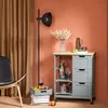 A kitchen cart with various items on and around it, set in a room with a curtain and a chair. Produktbild-Vorschau