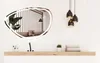 A bathroom vanity with a mirror, sink, and towels. Produktbild-Vorschau