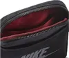 A close-up view of the inside of a black Nike bag with a red lining. Produktbild-Vorschau