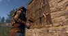 A person is shown building a structure in a video game. Produktbild-Vorschau