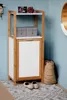 A bamboo shelf unit with a laundry box, placed in a bathroom or hallway setting. Produktbild-Vorschau