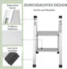 A close-up marketing image of a silver, two-step folding ladder, with callouts highlighting its features. Produktbild-Vorschau