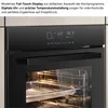 Close-up of an oven's digital display and interior. Voir les images du produit