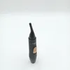 A black and gold nose trimmer is shown against a white background. Podgląd zdjęcia produktu