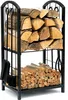 A black metal firewood rack filled with logs, with fireplace tools on the side. Produktbild-Vorschau