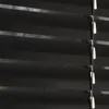 A close-up view of black aluminum blinds. Produktbild-Vorschau
