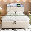 A beige upholstered bed with a tufted headboard and built-in shelf with LED lighting. Náhľad obrázku produktu
