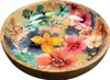 A close-up, overhead view of a decorative bowl with a floral pattern. Anteprima dell’immagine prodotto