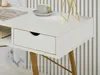 Close-up of a white desk with a drawer, a cup and saucer, and a magazine. Voir les images du produit