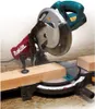 A Makita miter saw is shown cutting a piece of wood. Podgląd zdjęcia produktu