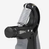 A close-up studio shot of a hand grip strengthener. Produktbild-Vorschau