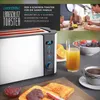 A breakfast scene featuring a four-slice long slot toaster, toast with jam, a glass of orange juice, and a cup of coffee, with a family enjoying breakfast in the background. Voir les images du produit