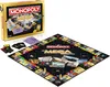 A Monopoly Mega Deluxe Edition board game is displayed with its box and game board laid out. Produktbild-Vorschau