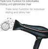 A close-up marketing image of a black hair dryer with rose gold accents, showing its nozzle and part of the handle. Text overlays describe its features. Podgląd zdjęcia produktu