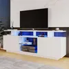 A modern white TV stand with LED lighting, featuring a television on top and electronic devices below. Náhľad obrázku produktu