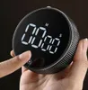 A hand is shown pressing the screen of a digital kitchen timer. Podgląd zdjęcia produktu