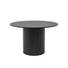 A black round table with a fluted base, isolated on a white background. Produktbild-Vorschau