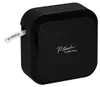 A black Brother P-Touch Cube Plus label maker is shown from a slightly elevated side angle against a white background. A white label with black text "P-TOUCH" is exiting the device. Náhled obrázku produktu