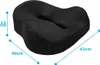 A black orthopedic seat cushion with dimensions indicated by blue lines and text. Podgląd zdjęcia produktu