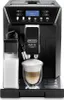 A black DeLonghi Eletta Cappuccino Evo coffee machine is shown with a glass of latte macchiato in front of it. Produktbild-Vorschau