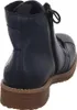 A close-up view of the back and side of a navy blue boot with a brown sole. Produktbild-Vorschau