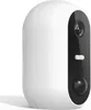 A white and black smart outdoor camera shown from a side angle. Produktbild-Vorschau