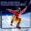 A snowboarder in mid-air, with a phone screen superimposed over the image. Produktbild-Vorschau