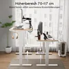 Two height-adjustable desks are shown in a bright room with large windows and sheer curtains. One desk is set to a higher position, and the other is set to a lower position. Anteprima dell’immagine prodotto