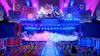 A stage setup with Bowser and other characters, with a crowd in the foreground. Produktbild-Vorschau