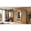 A bedroom scene featuring a large wardrobe with sliding doors and mirrored panels, a dressing table with a round mirror, and a chair. Produktbild-Vorschau