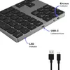 A close-up view of a wireless numpad with labels pointing out its features and a USB-C cable shown below. Náhled obrázku produktu