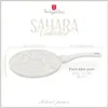 A marketing image of a pancake pan with multiple cartoon-shaped holes, showing dimensions and product name. Voir les images du produit