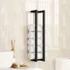 A bathroom setting with a towel rack holding rolled towels, a sink, and a soap dish. Anteprima dell’immagine prodotto