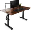 A standing desk with a monitor, keyboard, mouse, lamp, and headphones. Produktbild-Vorschau