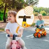 Two toddlers are playing with balance bikes outdoors on a paved path. Anteprima dell’immagine prodotto