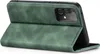 A green flip cover case for a smartphone is shown in an open position, revealing the phone's camera module. Produktbild-Vorschau