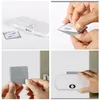 Collage showing how to attach an LED light with motion sensor using adhesive pads. Produktbild-Vorschau
