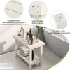 A white wooden shower bench with toiletries and towels, placed next to a bathtub. Podgląd zdjęcia produktu