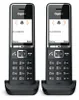 Two Gigaset cordless phones are shown side-by-side on their charging bases. Anteprima dell’immagine prodotto