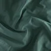 A close-up shot of wrinkled teal fabric. Produktbild-Vorschau