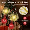 Christmas tree decorated with LED lights and gift boxes underneath. Voir les images du produit