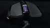 A close-up, top-down view of a black gaming mouse with illuminated scroll wheel. Produktbild-Vorschau