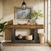 A console table with decorative items in a hallway setting. Anteprima dell’immagine prodotto
