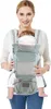 A woman is wearing a baby carrier with a baby inside. Náhled obrázku produktu